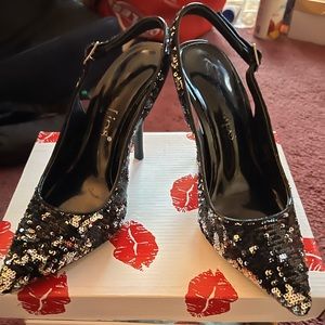 Black shiny sling back shoe